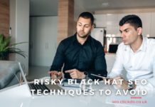 Two-men-in-an-office-talking-about-black-hat-SEO-techniques-to-avoid.